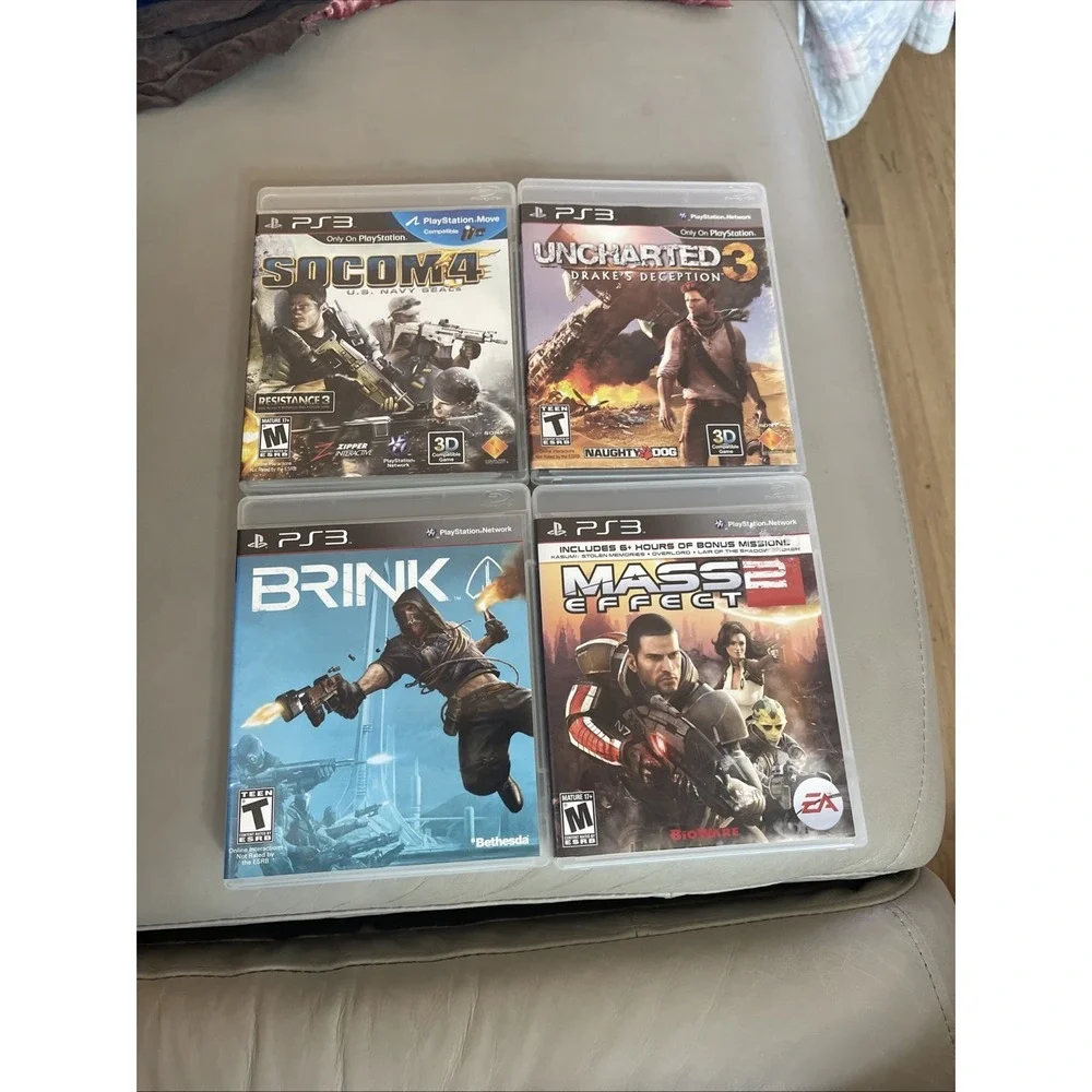 Lot of 4 Sony PS3 Games Brink Mass Effect‎ 2 Uncharted 3 Socom 4 CIB